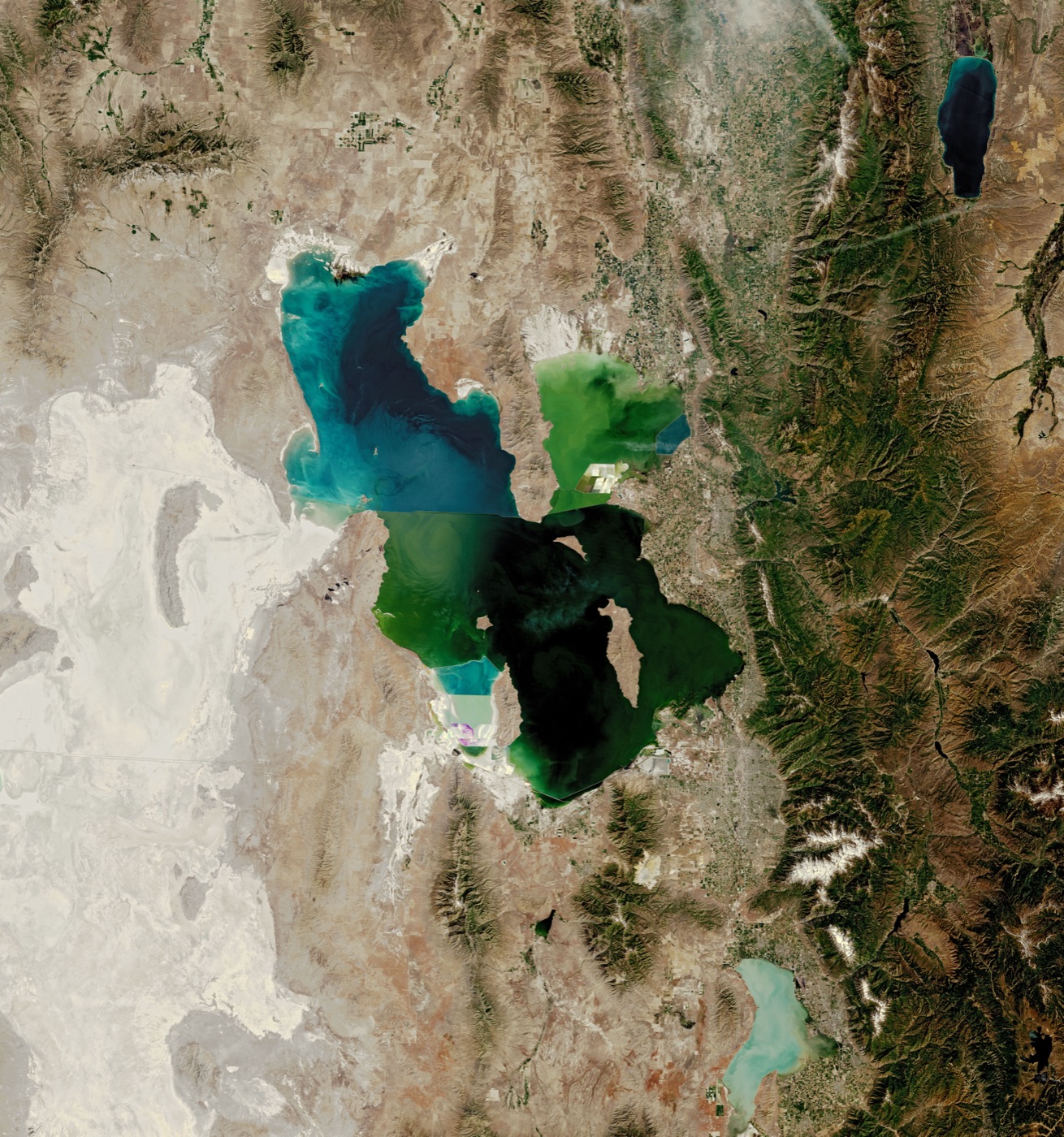 NASA Landsat satellite image of the Great Salt Lake in June 1985, showing the lake near its historic high water level with a deep blue, fully connected northern and southern basin